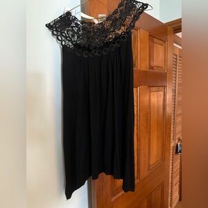 Lacey top.  Size medium.  Dress up or dress down. Black
